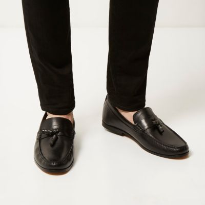 Black leather tassel loafers
